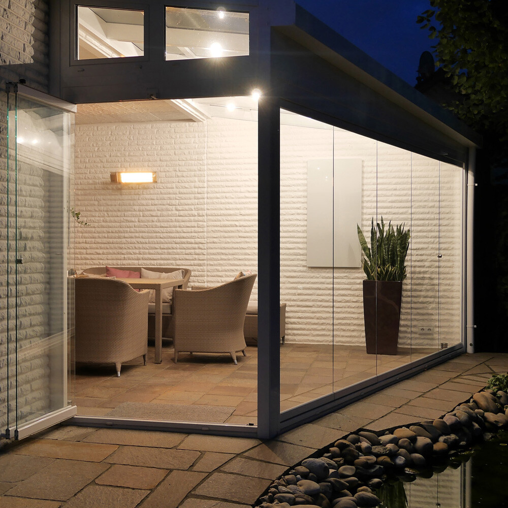 The Appino 20, VASNER's infrared patio heater with bluetooth app control, mounted in an open conservatory