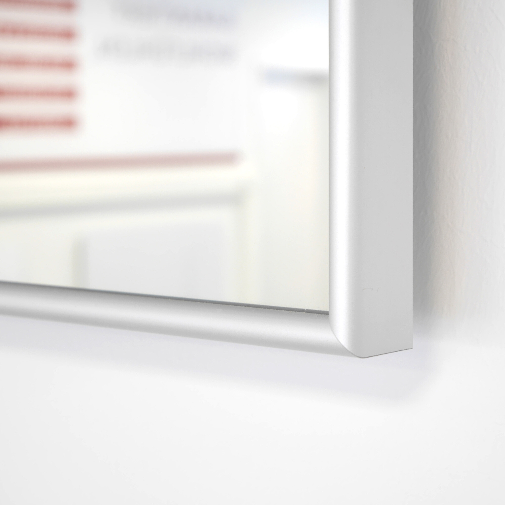 panel heater disguised as a normal bathroom mirror with aluminium frame